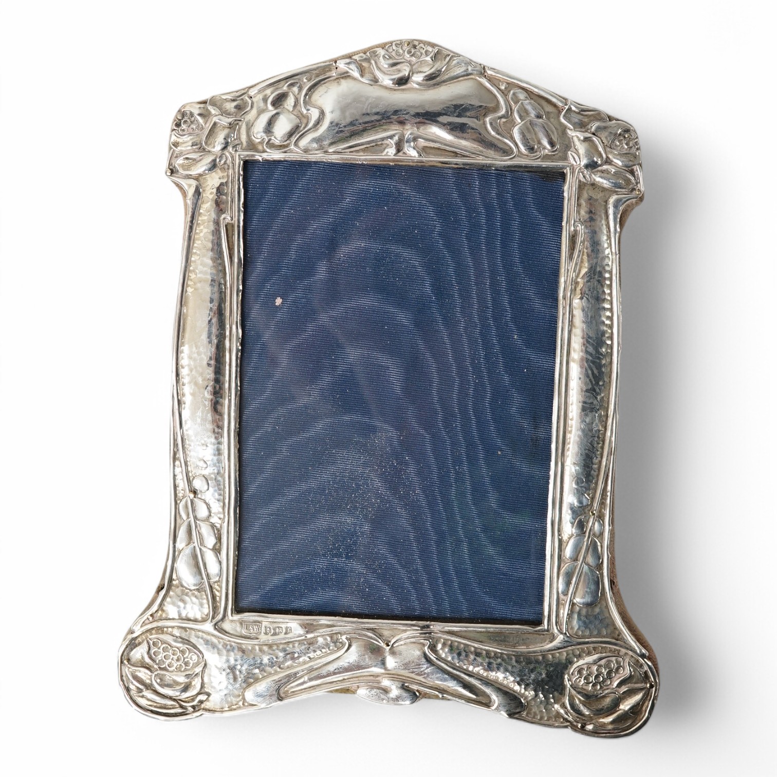 An Edwardian Art Nouveau silver mounted photograph frame, by L&W, with stylised decoration, Birmingham, 1905, 21.5cm. Condition - fair to good